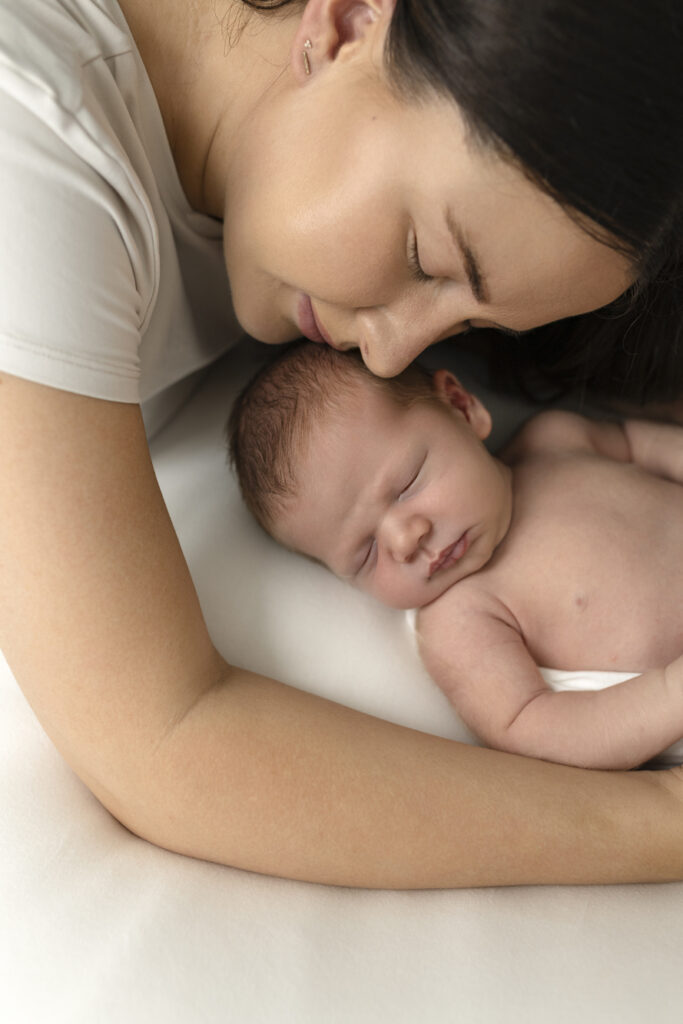 mother and newborn baby sleeping